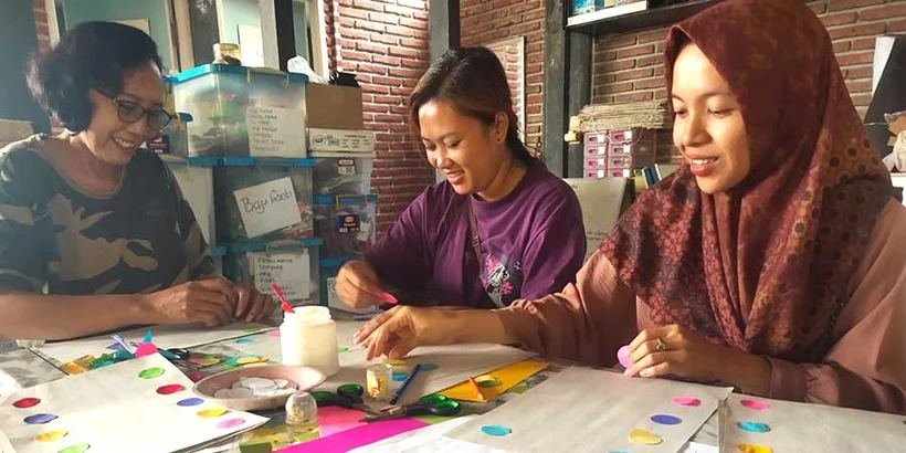 Parents at Joglo preschool doing some paint work