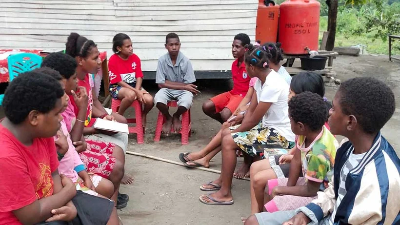 Power of Goodness West Papua in front of Orphanage