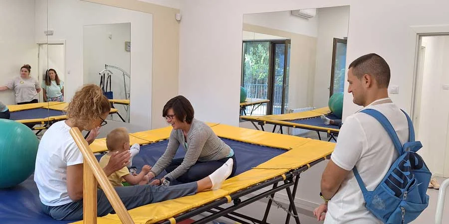 Raleigh Sadlier, Occupational Therapist, working with child and parents, Ann Arbor, 2025.jpeg