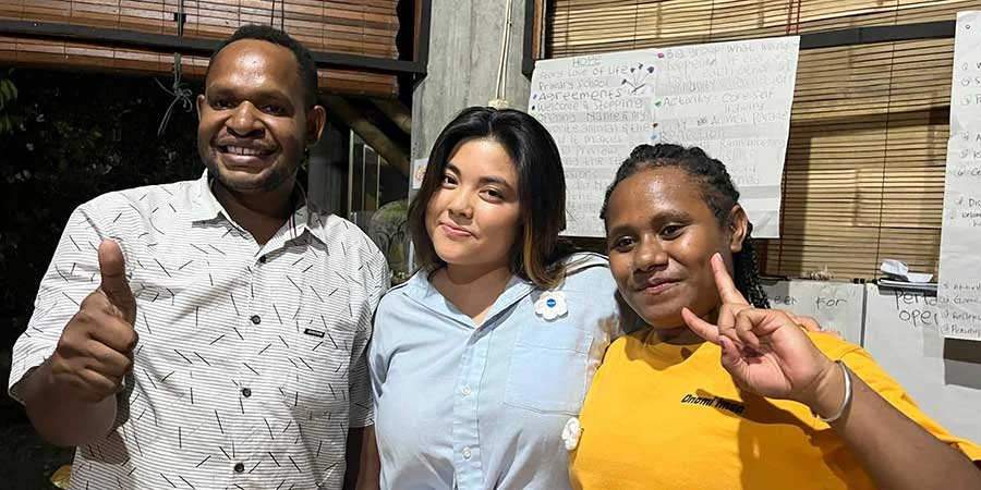 Olivia from the US with Patianus and Beti during the 2024 RJPT in Peace Place Pati (Olivia’s